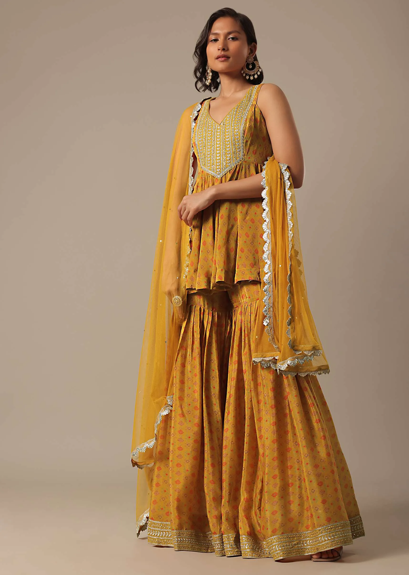 Mustard Yellow Sharara Set With Printed Peplum Top And Dupatta