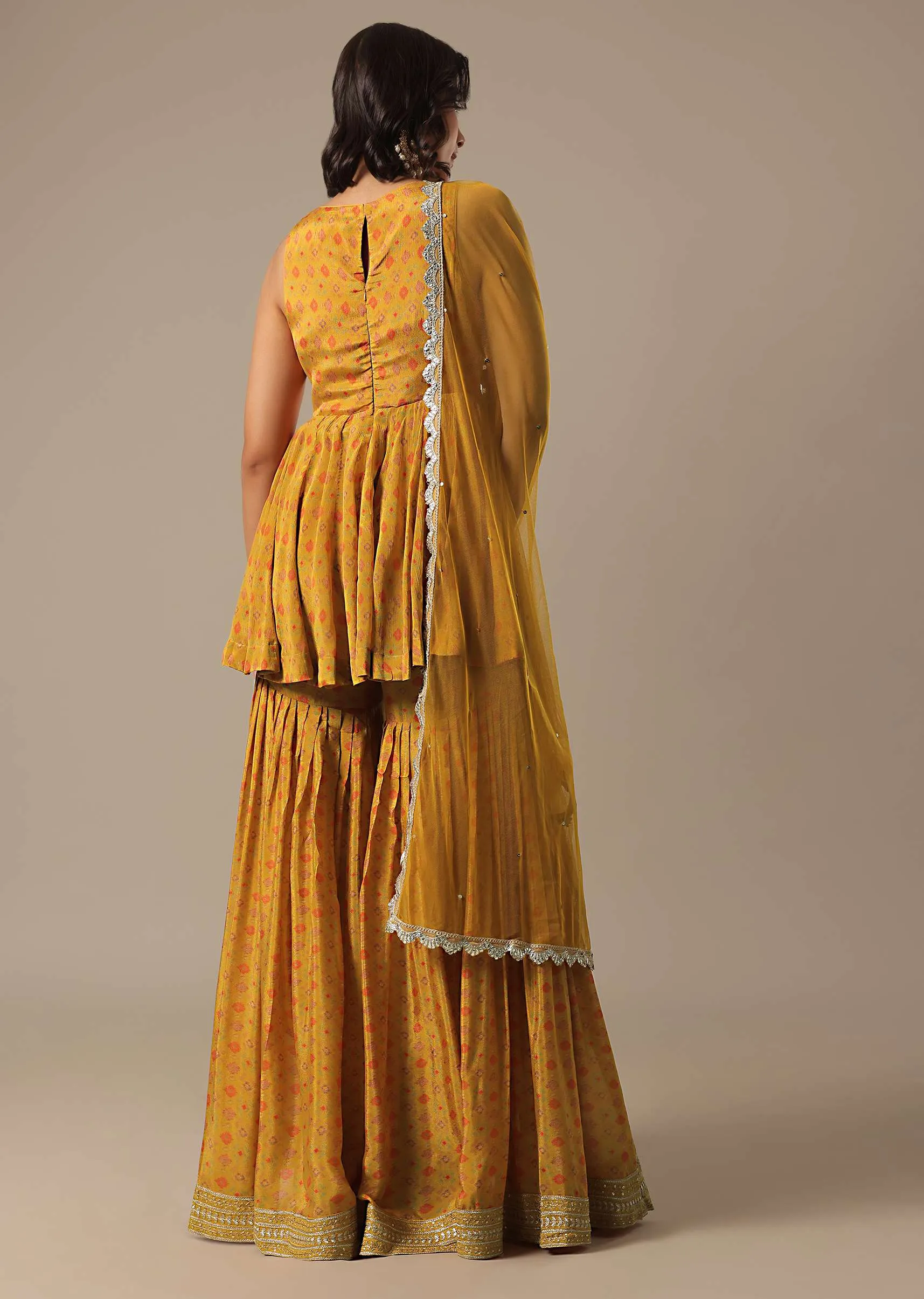 Mustard Yellow Sharara Set With Printed Peplum Top And Dupatta
